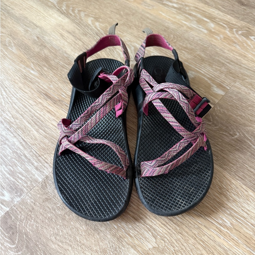 Black and pink Chacos